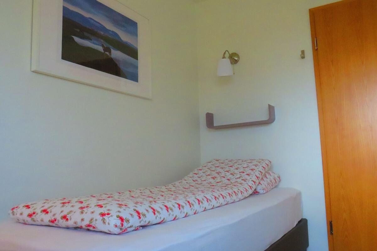 Single room with a single bed
